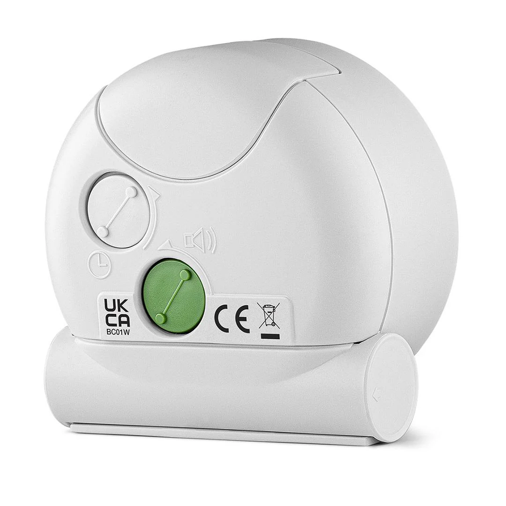 Braun BC01 white alarm clock with clean dial, yellow second hand, and matte case