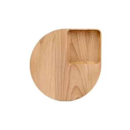 Round oak cutting board with petal-shaped silhouette by Gareth Neal