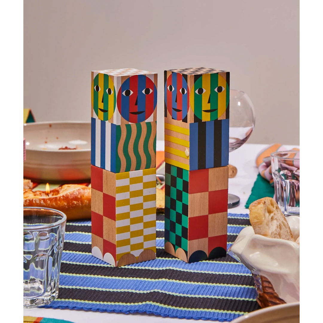 Modern adjustable salt and pepper grinder combining playful form and bold color