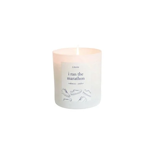 Literie I Ran the Marathon candle with bergamot, orange blossom, and sandalwood notes.