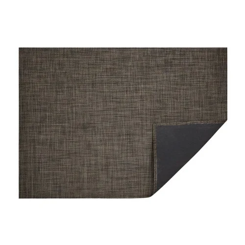 Sustainable Basketweave Rug by Chilewich, fade- and stain-resistant, ideal for indoor/outdoor spaces.