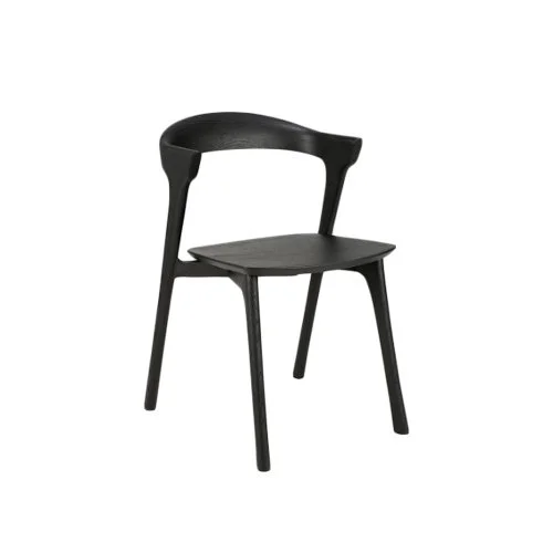 Bok Dining Chair by Ethnicraft with sculptural silhouette and solid oak frame.