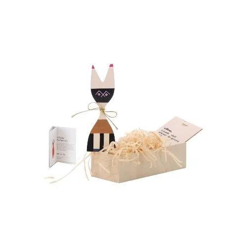 Vitra Wooden Doll No. 9, designed by Alexander Girard in 1953 — handcrafted midcentury decor with playful, artistic character.