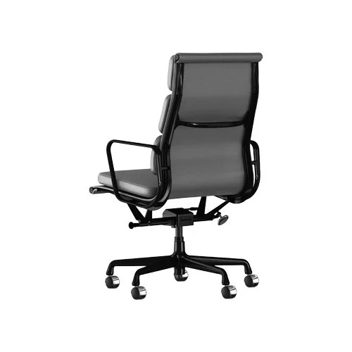 Padded leather office chair designed by Charles and Ray Eames