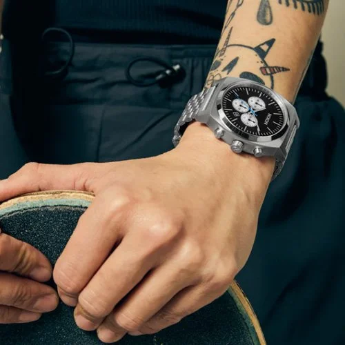 Nixon Time Teller Chrono in silver, midnight, and silver with stainless steel bracelet