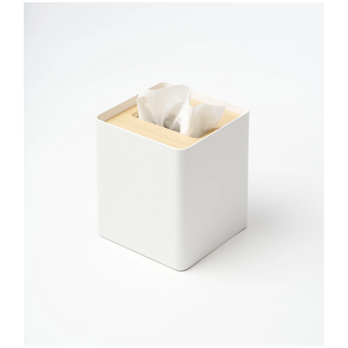 Minimalist Japanese tissue case blending modern design with natural materials.