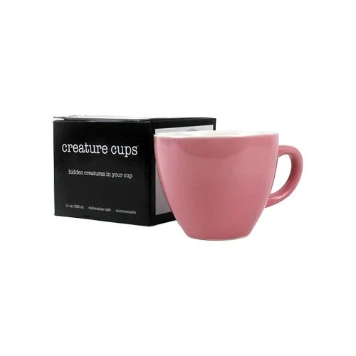 Modern novelty coffee cup with rabbit inside and microwave-safe finish.