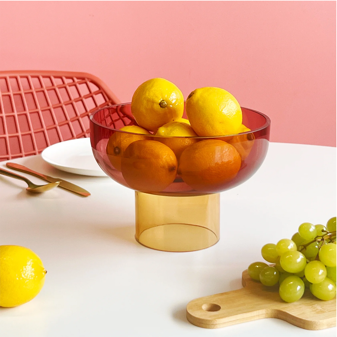 Modern decorative glass bowl—playful color and form for contemporary tabletops or shelves.