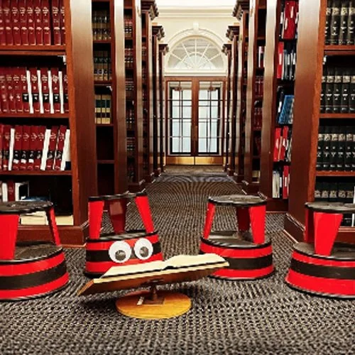 Iconic rolling step stool combining industrial strength and classic design.