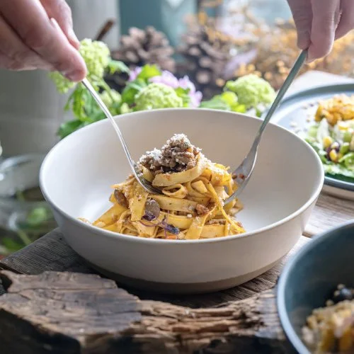 Wide, versatile serving bowl perfect for pasta, salads, or shared dishes.