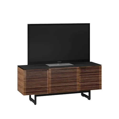 Modern entertainment console with media drawer, shelving, and louvered doors.
