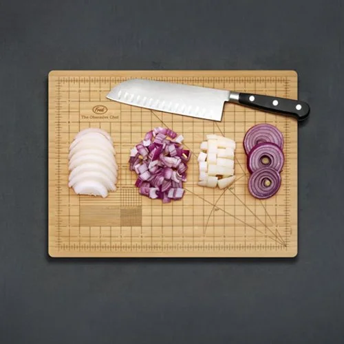 Fred Obsessive Chef bamboo cutting board with laser-etched measurement guides.
