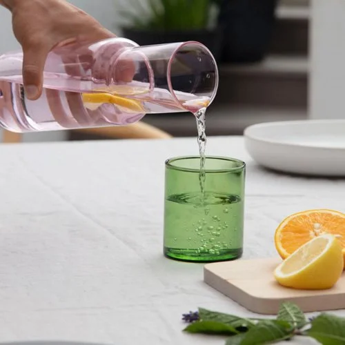Pink and Green heat-resistant carafe for modern dining or décor.