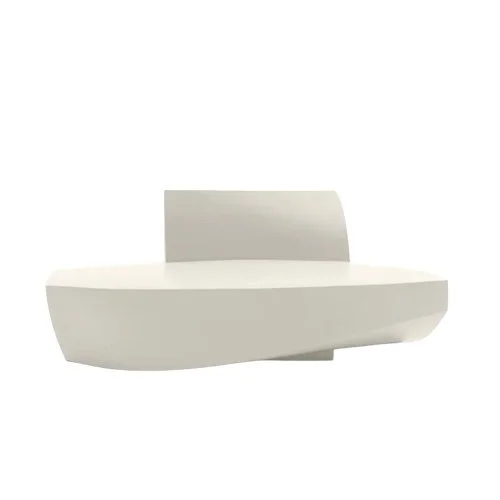 Frank Gehry’s rotational-molded sofa in clean white and metallic silver.