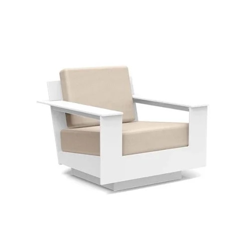 Low-slung modern outdoor lounge chair built from eco-friendly recycled plastic.