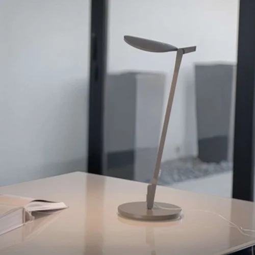 Minimal silver workspace lamp featuring smooth movement and efficient LED illumination.
