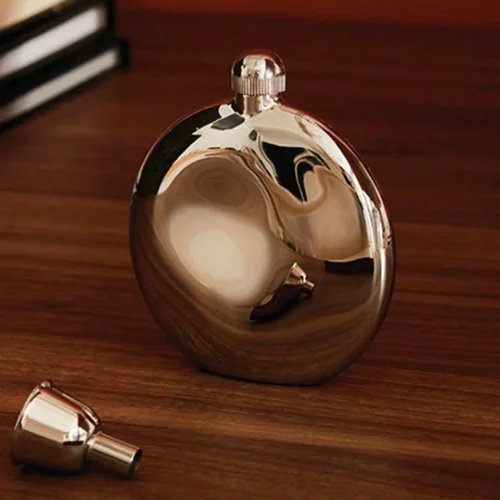 Modern Alessi hip flask with liquid-like silhouette; durable stainless steel, compact and pocket-friendly.