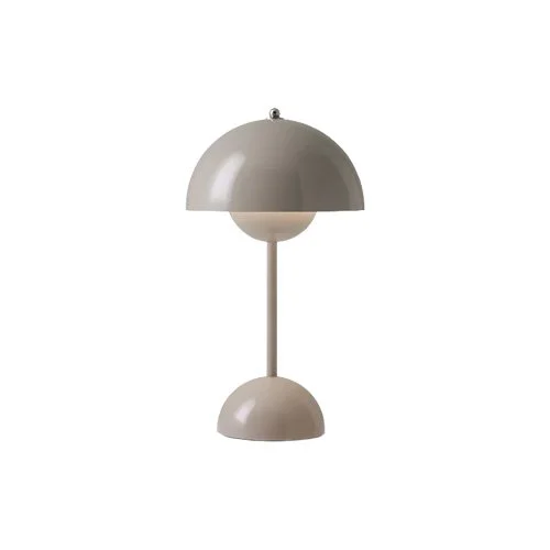 Grey beige portable lamp providing soft ambient LED lighting and minimalist curves.