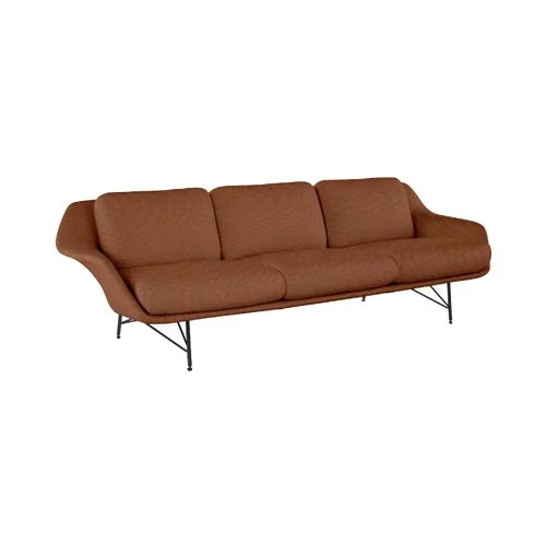 Sculptural upholstered sofa in premium fabric with minimalist metal legs.