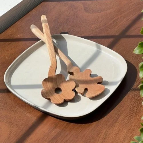 Stylish kitchen accessory combining material craftsmanship and expressive form by designer Selena Liu.