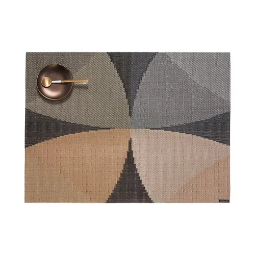 Chilewich Canopy Placemats with petal-like forms, multi-tonal color, and richly textured double-weave construction.