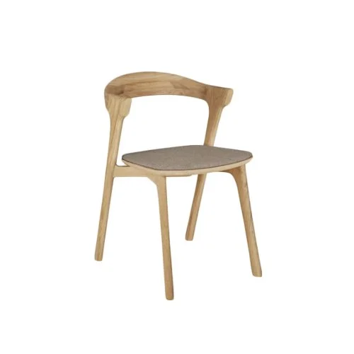 Bok Dining Chair by Ethnicraft with sculptural silhouette and solid oak frame.