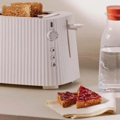 Designer toaster from Alessi combining sculptural form with everyday function.