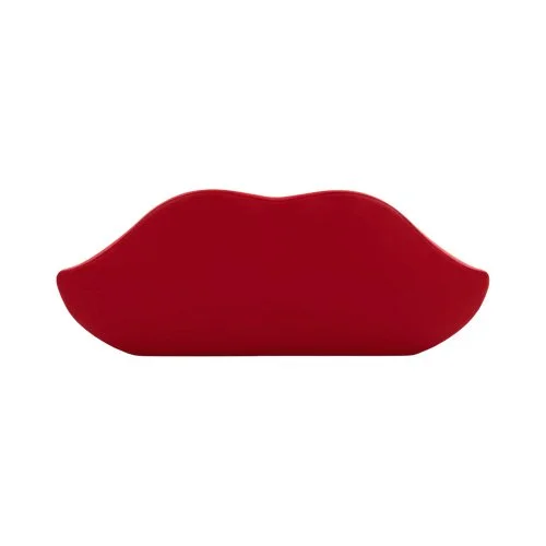 Modern sculptural seating in the form of a red kiss, designed for indoors or out.