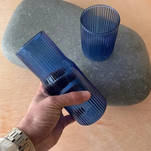 Contemporary blue glass carafe by Gry Mattr perfect for water, wine, or juice.