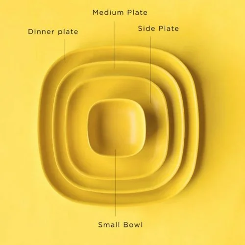 Bright Lemon yellow bamboo dinner plate by Ekobo for colorful, sustainable dining.