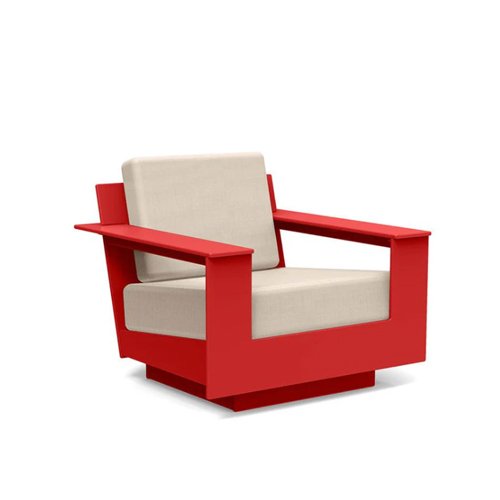 Low-slung modern outdoor lounge chair built from eco-friendly recycled plastic.