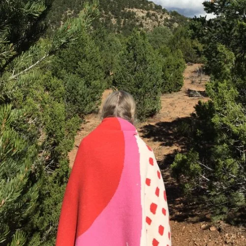 Breathable, year-round throw in recycled fibers for design-forward homes.