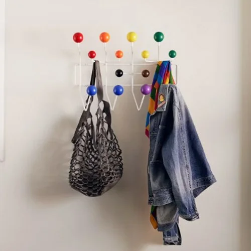 Iconic wall-mounted rack by Charles and Ray Eames in bold, colorful finishes.