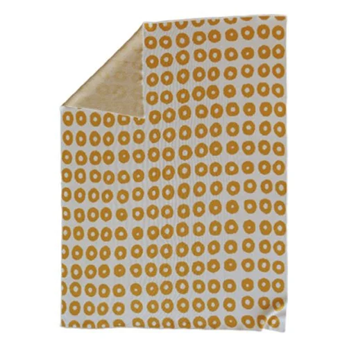 Sustainable cotton blanket designed by textile artist Trilby Nelson