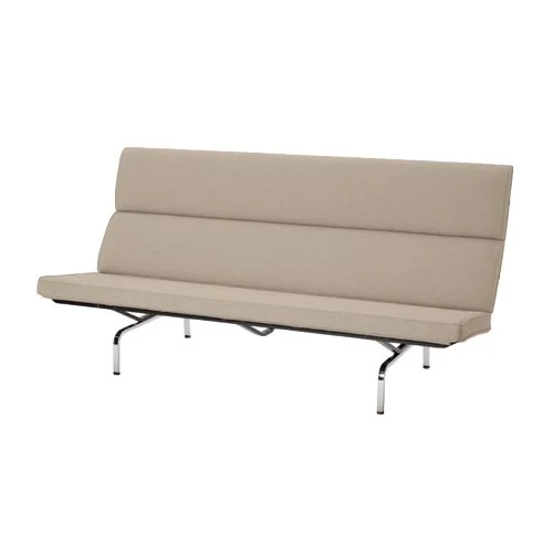 Compact modernist sofa by Charles and Ray Eames with tight back and clean lines.