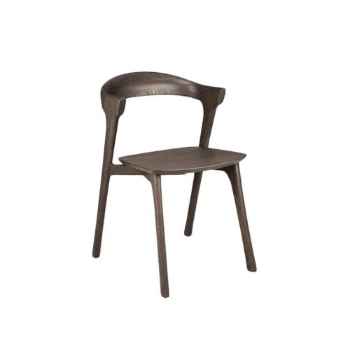Bok Dining Chair by Ethnicraft with sculptural silhouette and solid oak frame.