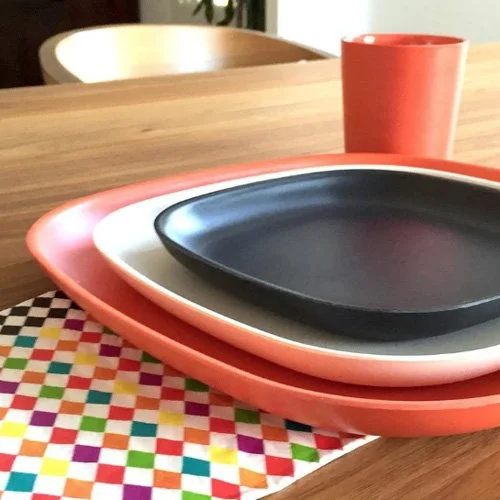 Bold Persimmon bamboo dinner plate by Ekobo brings warmth to modern dining.