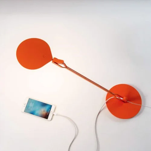 Minimal silver workspace lamp featuring smooth movement and efficient LED illumination.