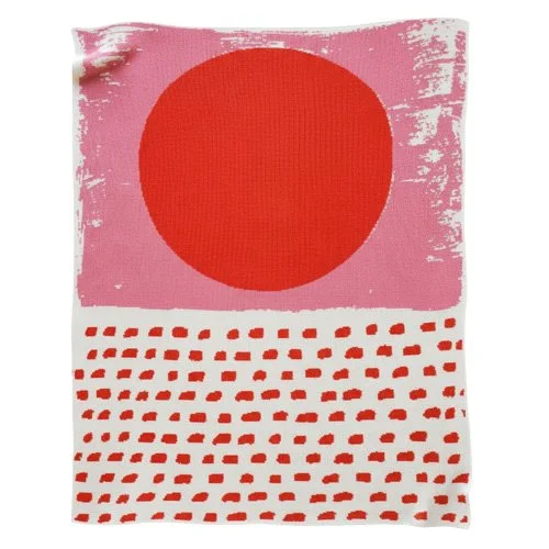 Pink Dot recycled-cotton knit throw by Trilby Nelson; modern geometric accent, made in USA and easy-care.