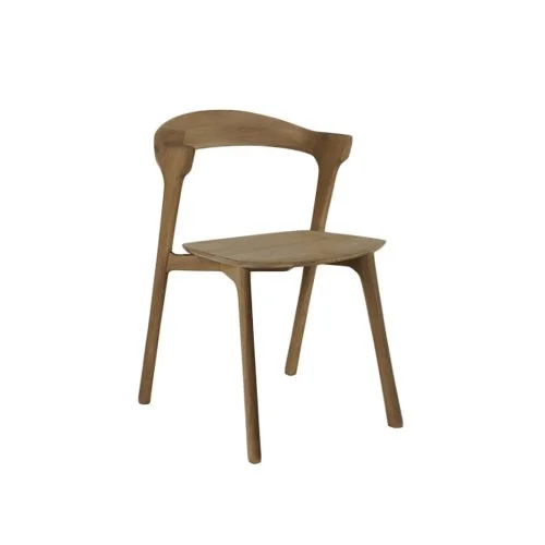 Bok Dining Chair by Ethnicraft with sculptural silhouette and solid oak frame.