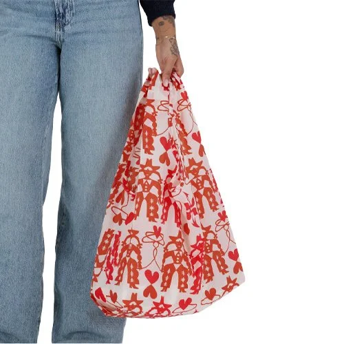 Sustainable foldable shopping bag combining bold western design and lasting durability.