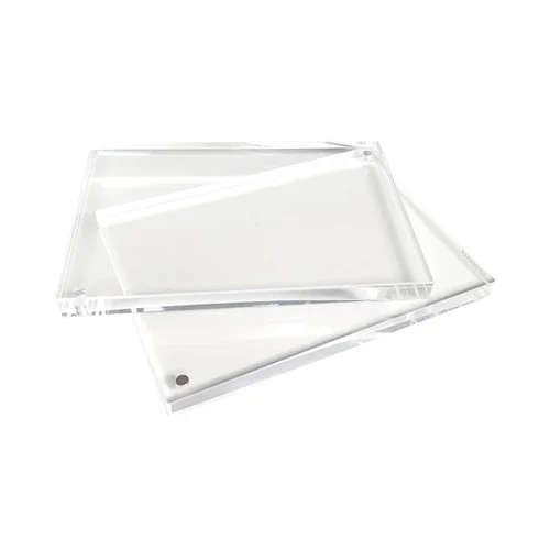Crystal-clear acrylic photo frame by Canetti with a frameless, magnetic design for a sleek, floating photo display.