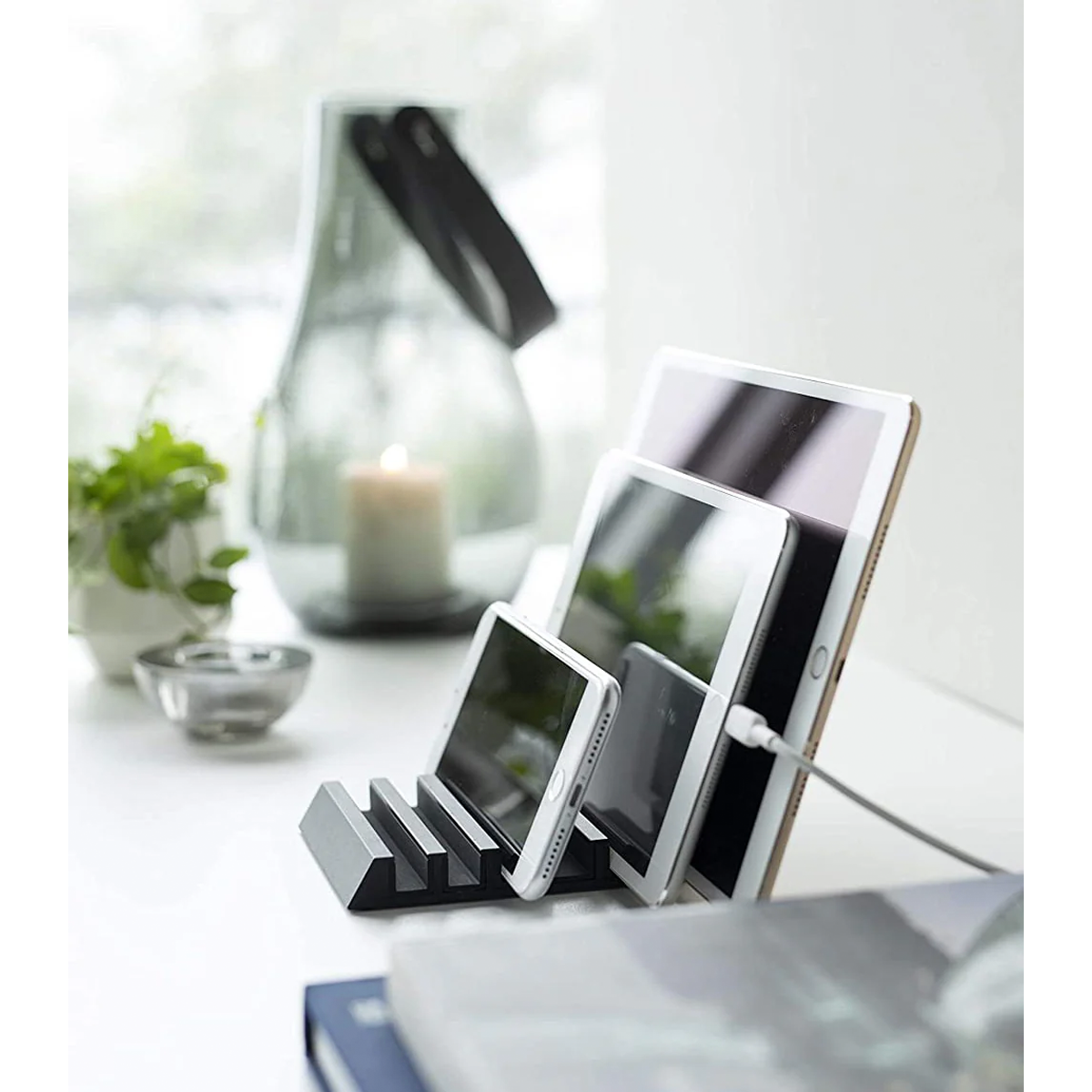 Durable black aluminum stand by Yamazaki, ideal for workspaces and everyday use.