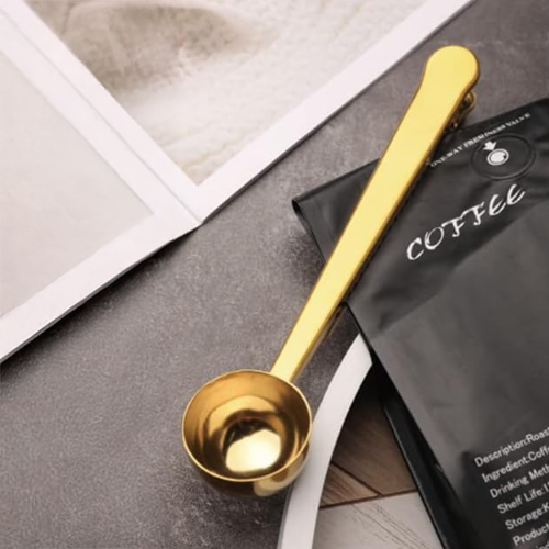 Dual-purpose coffee scoop and bag clip offering precision measurement and storage convenience