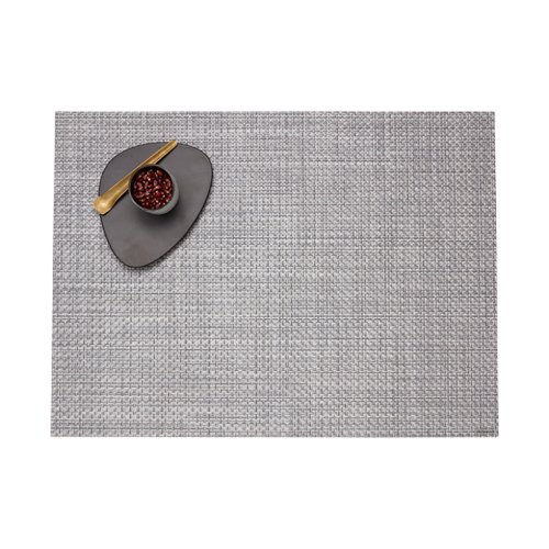 Reversible indoor-outdoor table mats designed for casual dining, layered settings, and entertaining.