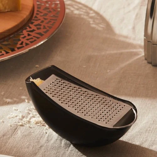 Compact red and clear Parmenide Cheese Grater by Alessi, stainless steel top with integrated storage. (Copy)