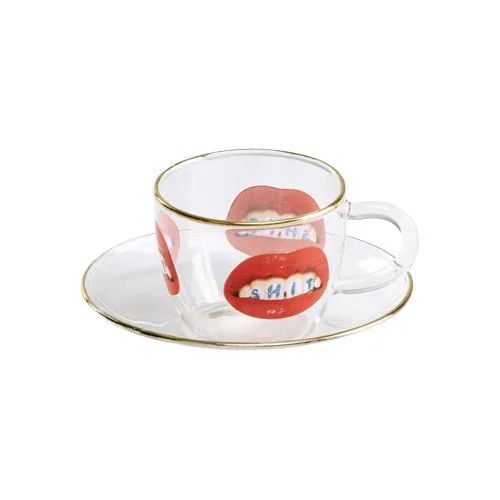 Designer glass coffee cup and saucer by Seletti with vivid surface imagery