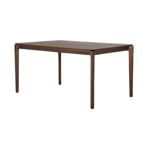 Bok Dining Table in a modern dining room setting, highlighting its versatile design and sophisticated presence.