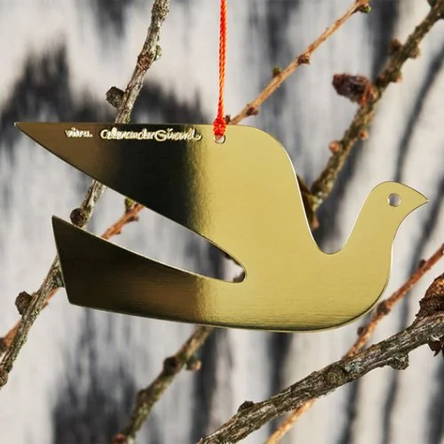 Designer brass ornament inspired by Girard’s 1965 folk and modernist design language.