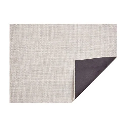 Durable Basketweave Rug by Chilewich, easy-care and fade-resistant for indoor/outdoor living.